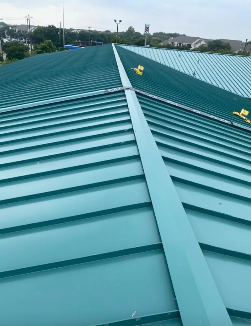 Green commercial metal roof ridge and valley for Metal Roof Repair in Pearl